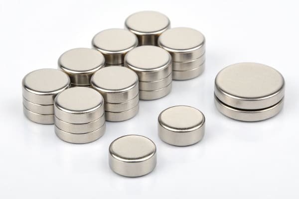 A collection of small, precision NdFeB magnets for consumer electronics like smartphones and wearables.